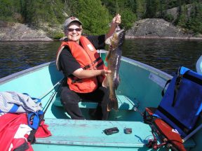 Lady Holding big Walleye caught at Flindt Landing Camp